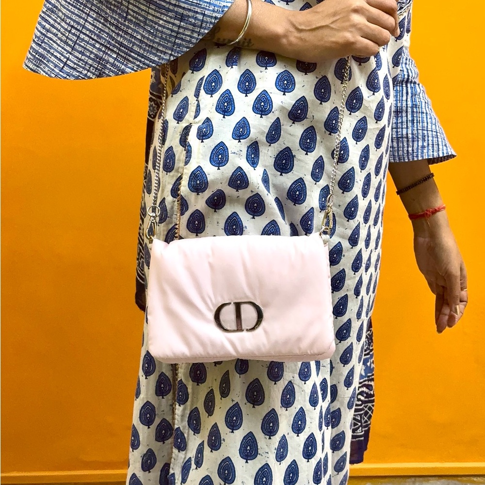 Dior Soft Pink Trousseau Sling Elegant Cosmetic Bag with attached silver chain